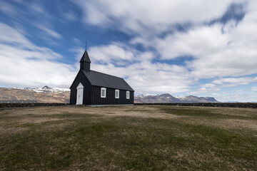 Fototapeta premium A famous black church or Búðakirkja in the Snaefellsnes peninsula, west Iceland
