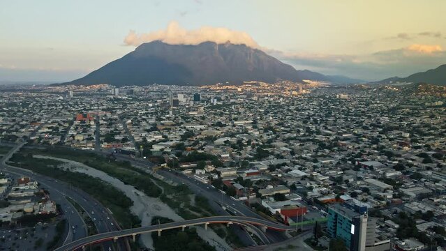 Aerial drone view of Cerro de la Silla and Monterrey cityscape, Mexico