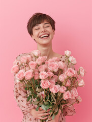 beautiful happy woman, short hair, holding bouquet of roses, light pink background, studio shot. Social media influencer