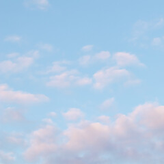 Background of blue sky with pink clouds in sunset