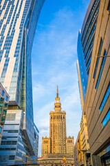 Palace of Culture and Science with modern buildings in Warsaw, Poland