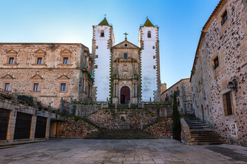 Plaza mayor with the church of San Javier with its two white towers in the city of Caceres, Spain
