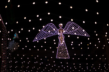 LED Christmas lighting decoration against black background.