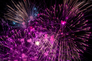 Beautiful colorful fireworks at night. Selective focus. 