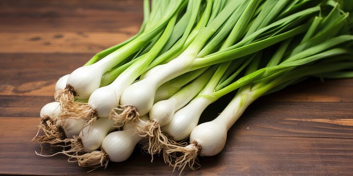 Immature green onions, also known as scallions or spring onions, are young onions harvested before they fully mature. They have long green stalks and small white bulbs and are prized for their mild