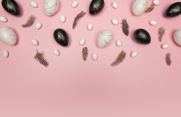 Top view of easter eggs, feathers on pink background. Creative easter composition, spring, flat lay, copy space.