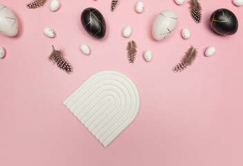 Top view of easter eggs, feathers on pink background. White arch tray, product presentation. Creative easter composition, spring, flat lay, copy space.