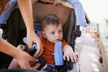 Baby, pram and outdoor for park, hands and mother for walk and family time with child. Kid,...