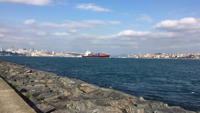 A cargo ship navigating the Bosporus Strait in Istanbul