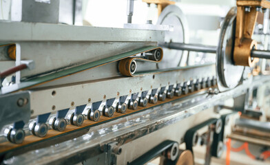 Fototapeta premium Close up view of factory machine indoors at daytime