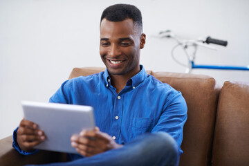 Man, tablet and smile for social media at home, online and internet for website or blog. Black male...
