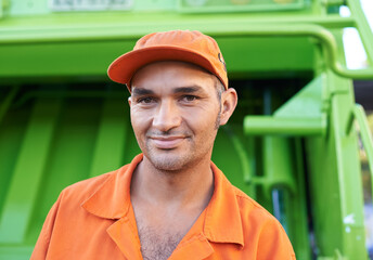 Male, garbage collector and dump truck smiling portrait, sanitation and municipal worker for world...