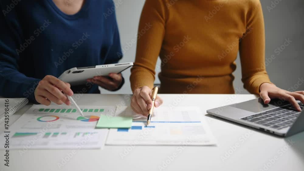 Poster business documents on office table with smart phone and calculator digital tablet and graph business