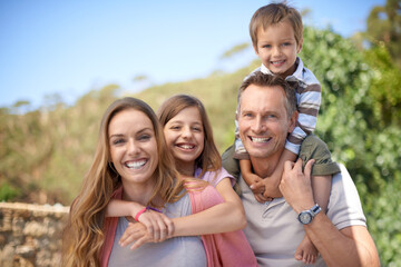 Parents, children and portrait with smile for travel together or vacation bonding in summer or family, sunshine or relax. Mother, daughter and siblings on shoulders in Florida or garden, park or love