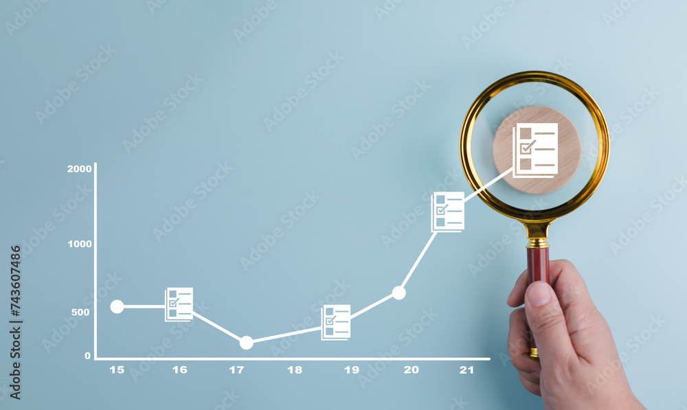 Poster the man is holding magnifying glasses under a concept.online documentation database, it consultant b