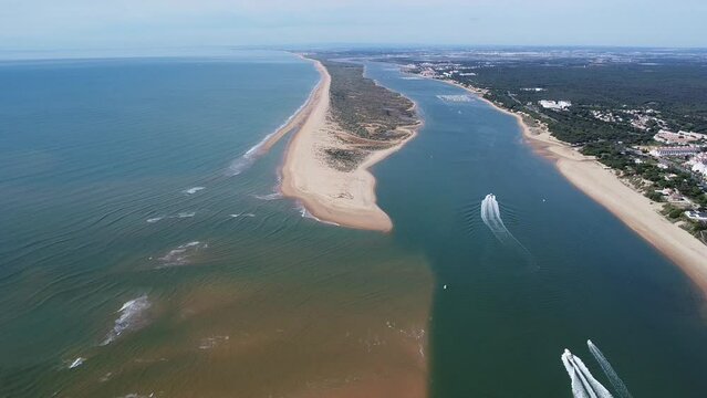Aerial view of the Rompido Arrow (La Flecha del Rompido), a sand bank formed on the Rompido and Portil beaches that already reaches La Bota beach, in the municipality of Punta Umbria, Huelva province