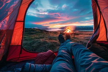 Poster View from inside tourist tent. Night camping near mountains and hills. Burning campfire under beautiful evening sky. © Irina Schmidt