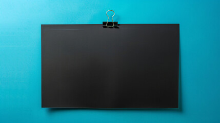 Blank black poster with binder clip mockup.