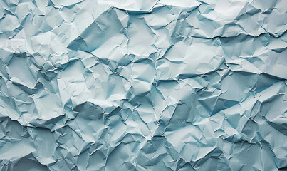 Obraz premium Textured Expanse of Crumpled Blue Paper Captured in Soft Lighting