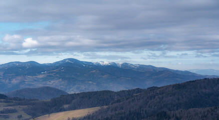 Panorama of Radziejowa Range in early spring, view from village Wierchomla. Beskid Sadecki Mountains, Poland.