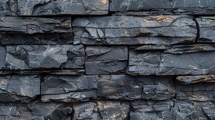 Texture of a black painted brick wall as a background or wallpaper