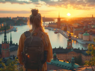 Fototapete Stockholm Travelling woman in Stockholm, Sweden at sunset during summer