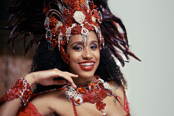 Samba, carnival or happy woman in costume or portrait for celebration, music culture or band in Brazil. Event, party or proud girl dancer with smile at festival, parade or fun show in Rio de Janeiro