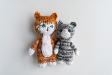 Knitted toy cat on a white background - 743657064