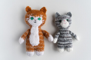 Knitted toy cat on a white background - 743657094