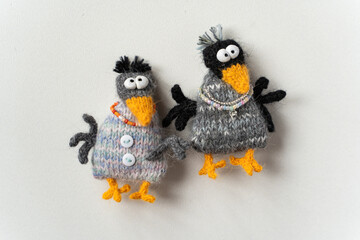 Knitted crow toys on a white background - 743657224