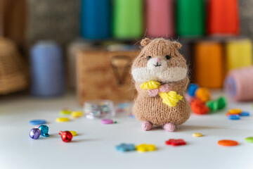 Knitted hamster toy with yarn and knitting accessories - 743657689