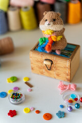 Knitted hamster toy with yarn and knitting accessories - 743658065