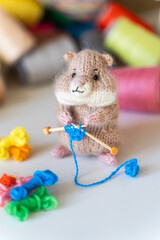 Knitted hamster toy with yarn and knitting accessories - 743658430