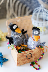 Knitted crow toys with decorations and shiny objects - 743658667