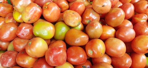 Pile of red tomatoes. Sold in traditional market