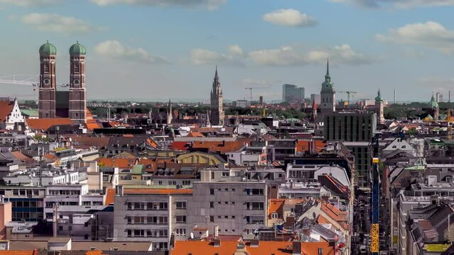 Munich cityscape old town view munich cuhrch cathedral frauenkirche marienplatz time lapse.