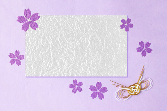和紙の切り絵風デザインのフレーム　紫色の桜の花と金と白の水引結び（薄紫の背景）