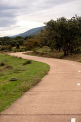 Walking trail in a small village as marvelous moutain view with blue cloud sky,