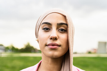 Portrait of Muslim woman looking in front of camera