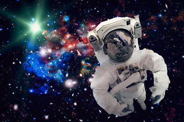 Astronaut surfing dark space with stars. The elements of this image furnished by NASA. - 743686684
