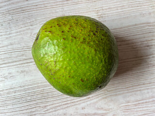 avocado on wooden table