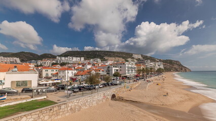 Fototapeta na wymiar Panorama showing aerial view of Sesimbra Town and seaside timelapse, Portugal.