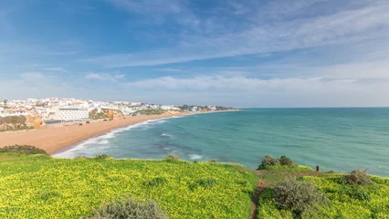 Crédence de cuisine en verre imprimé Plage de Marinha, Algarve, Portugal Wide sandy beach and Atlantic ocean in city of Albufeira timelapse. Algarve, Portugal