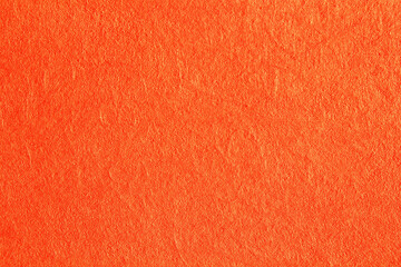 Naklejka premium Abstract design background orange grunge recycled natural paper texture. Old fiber uneven, rough cardboard sheet seamless spotted surface pattern. Close-up, mock up, top view