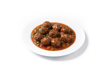 Meatballs, green peas and carrot with tomato sauce isolated on white background