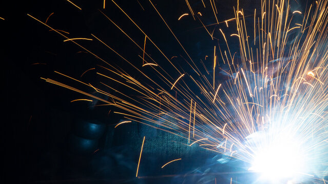 Sparks and flash from electric welding