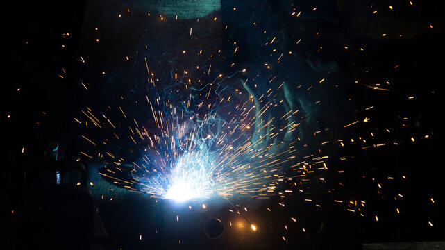 Sparks and flash from electric welding
