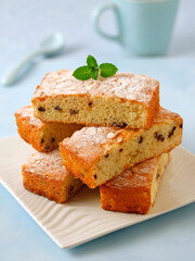 Sponge cake with chocolate chunks and almonds,