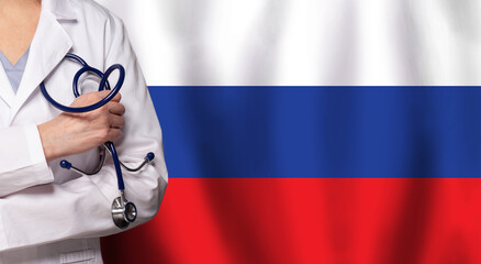 Russian medicine and healthcare concept. Doctor close up against flag of Russia background