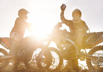 Sport, racer or people on motorcycle outdoor on dirt road and relax after driving, challenge or...